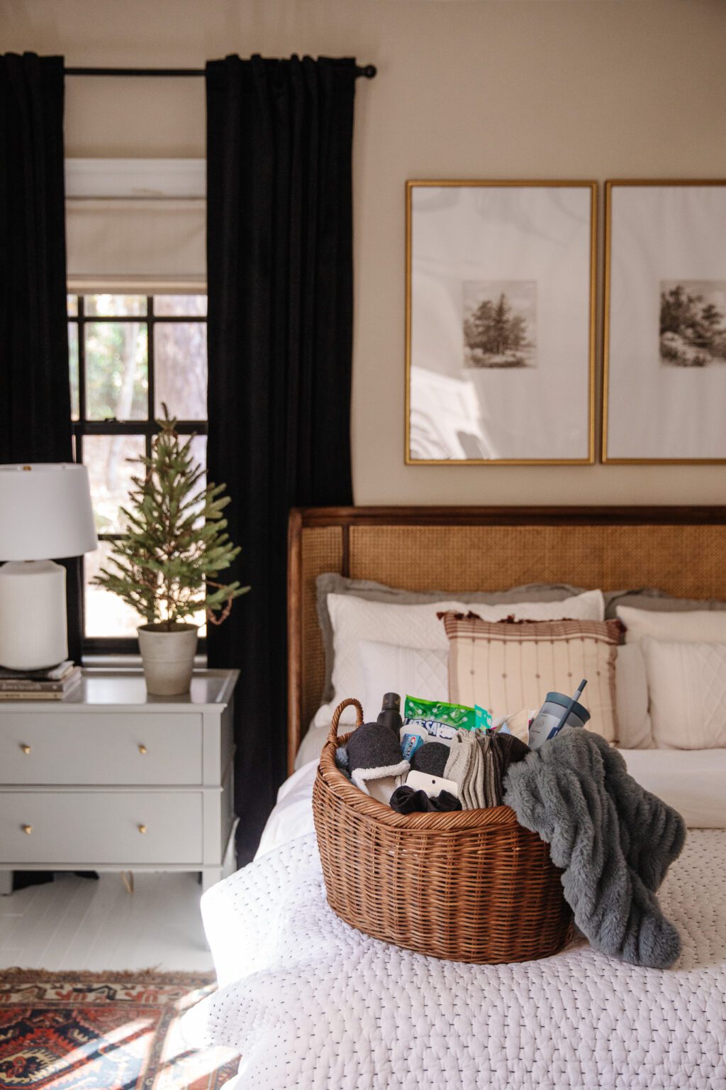 budget Christmas decorating ideas featurng a bedroom with basket on top of bed