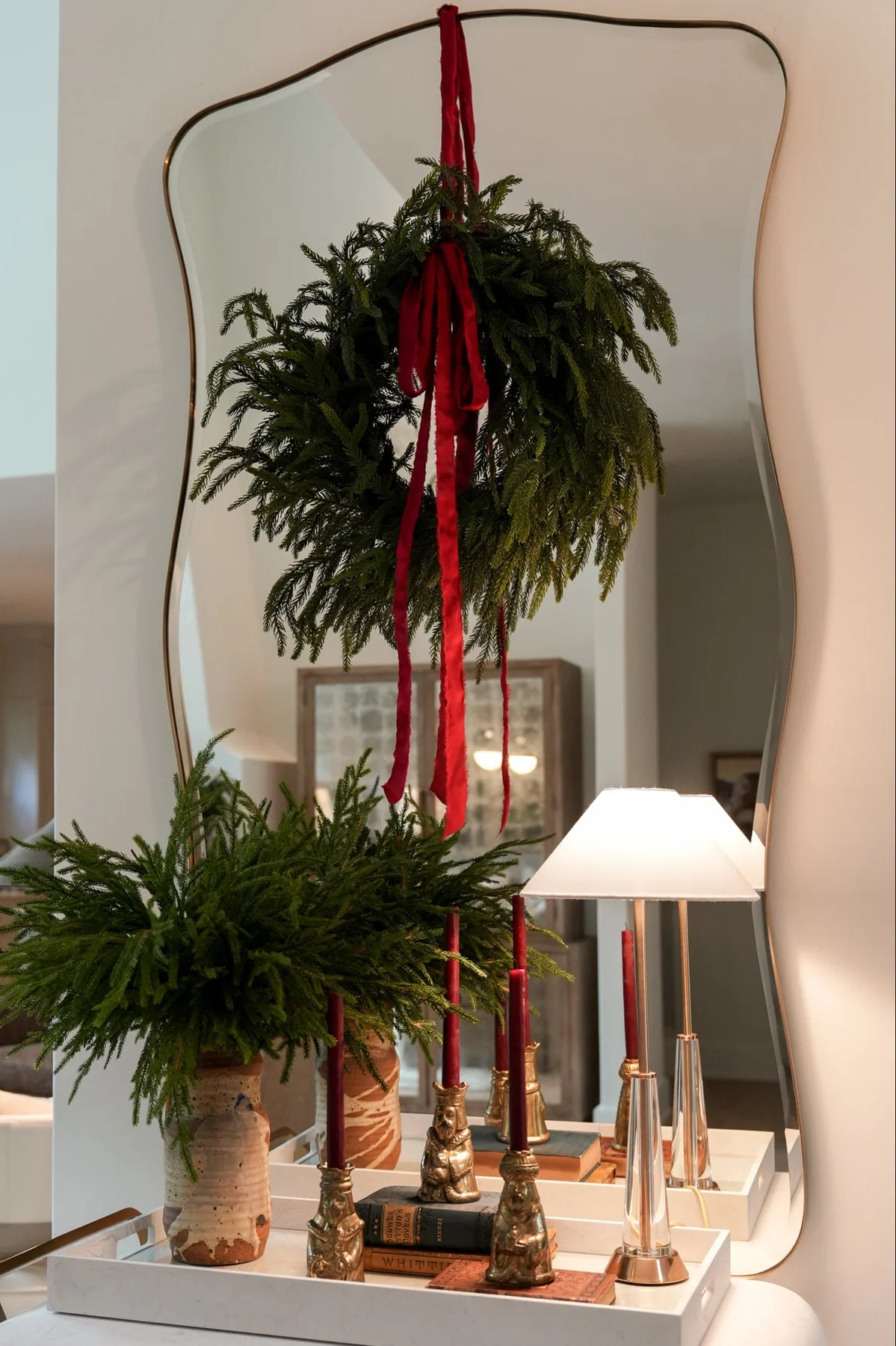 budget Christmas decorating ideas featurng a entryway with holiday decorations