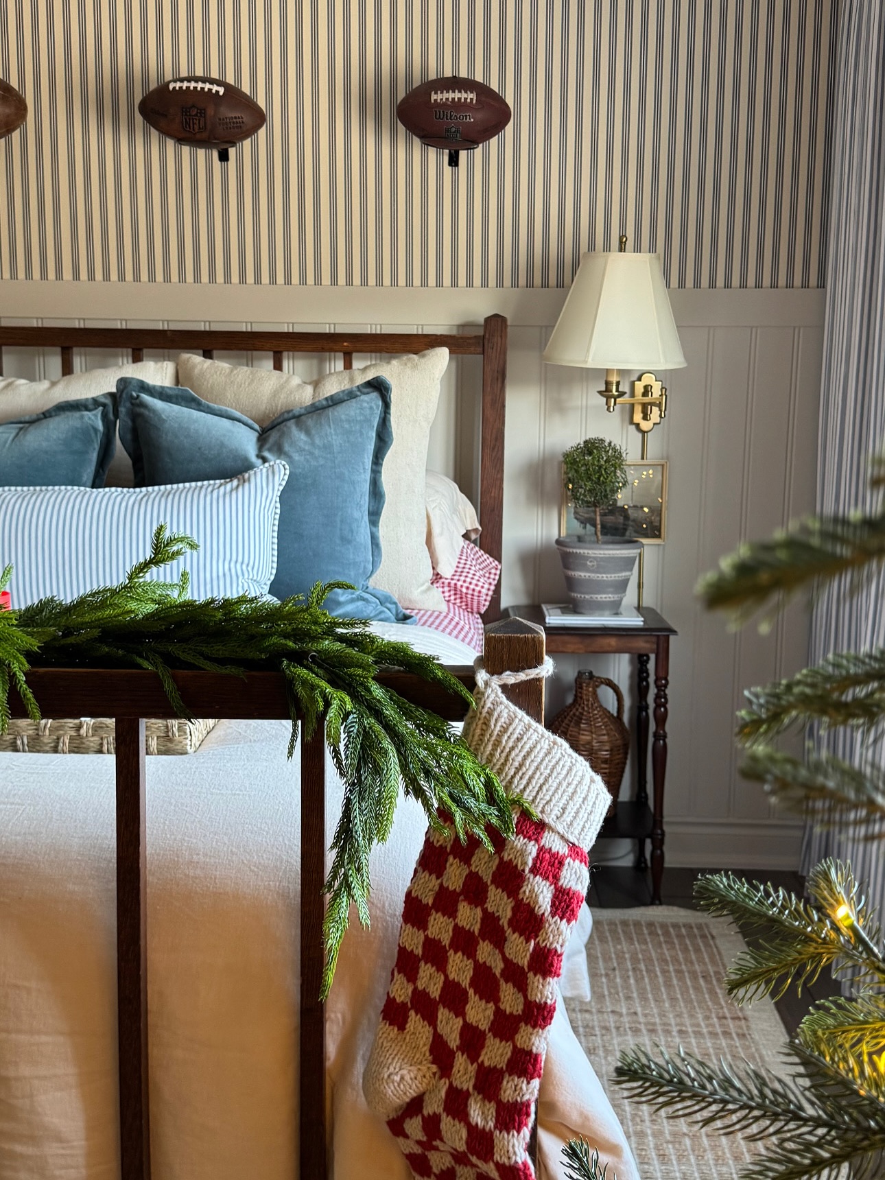 budget Christmas decorating ideas featurng a bedroom with holiday decorations