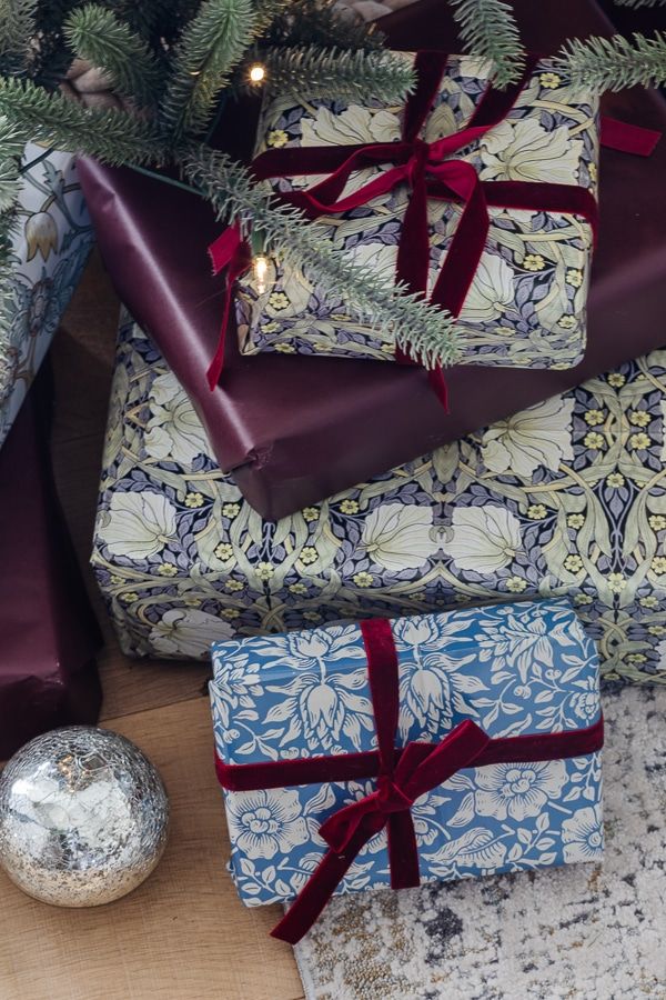 Ralph Lauren Christmas Tree Decor ideas featuring traditional chinoiserie paper wrapped gifts in blue and red