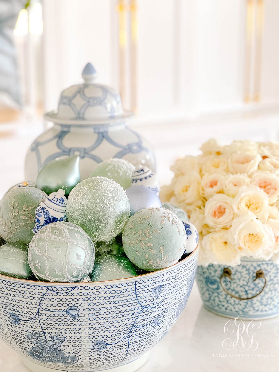 light blue christmas ornaments in bowl shown as example of pastel Christmas decor ideas