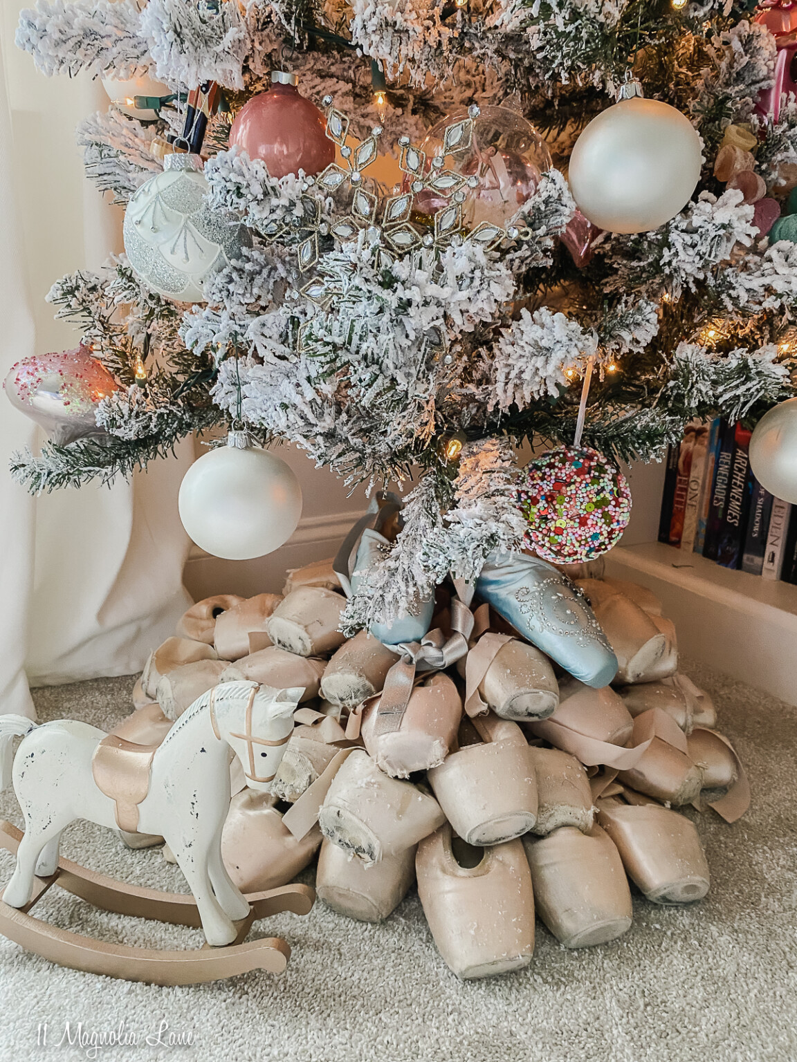 Christmas tree styled with nutcrackercore Christmas decor featuring ballet shoes