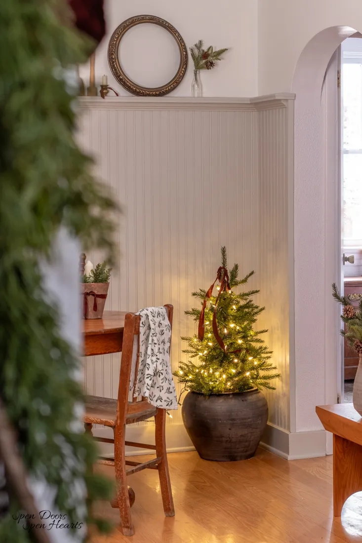 Budget Christmas kitchen styling tips and ideas featuring small Christmas tree