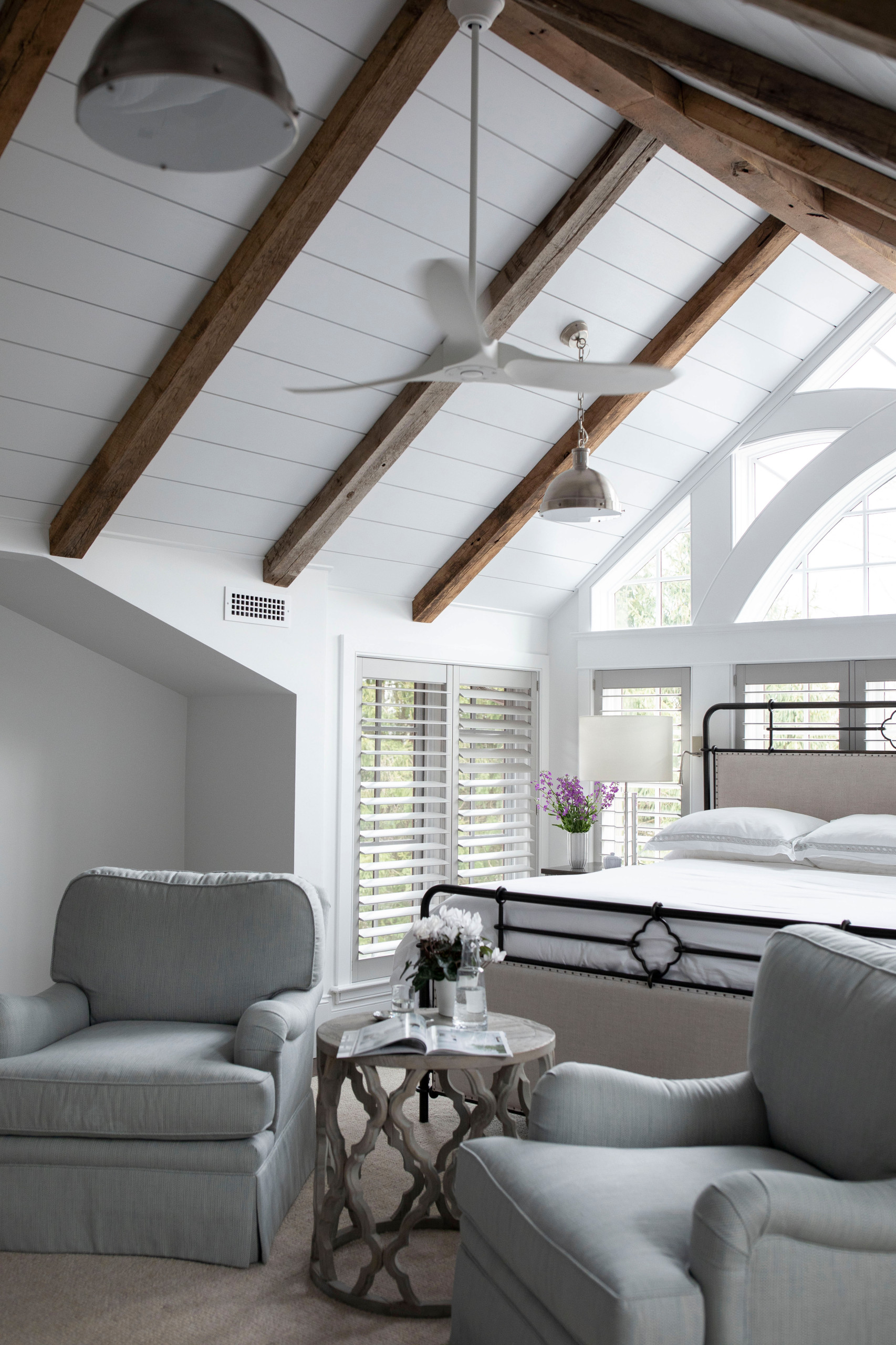 southern transitional home featuring a historic barn remodel bedroom showcased in home tour