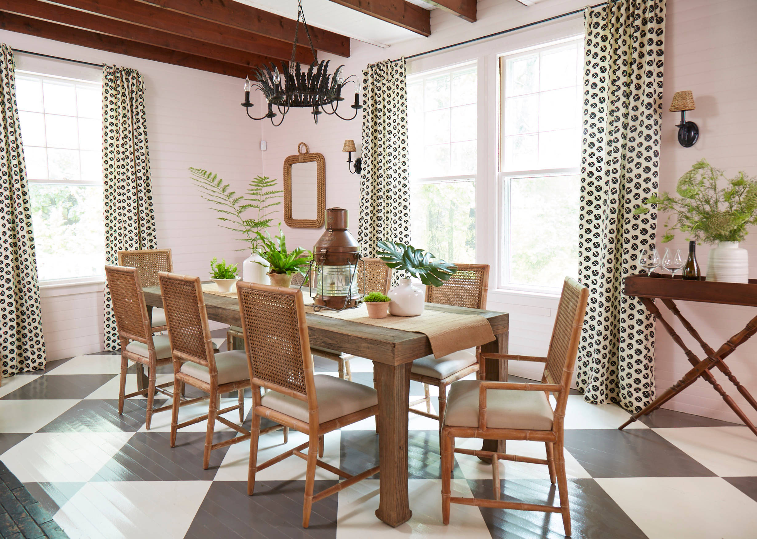 Whimsical coastal cottage interior featuring a home dining room in home tour