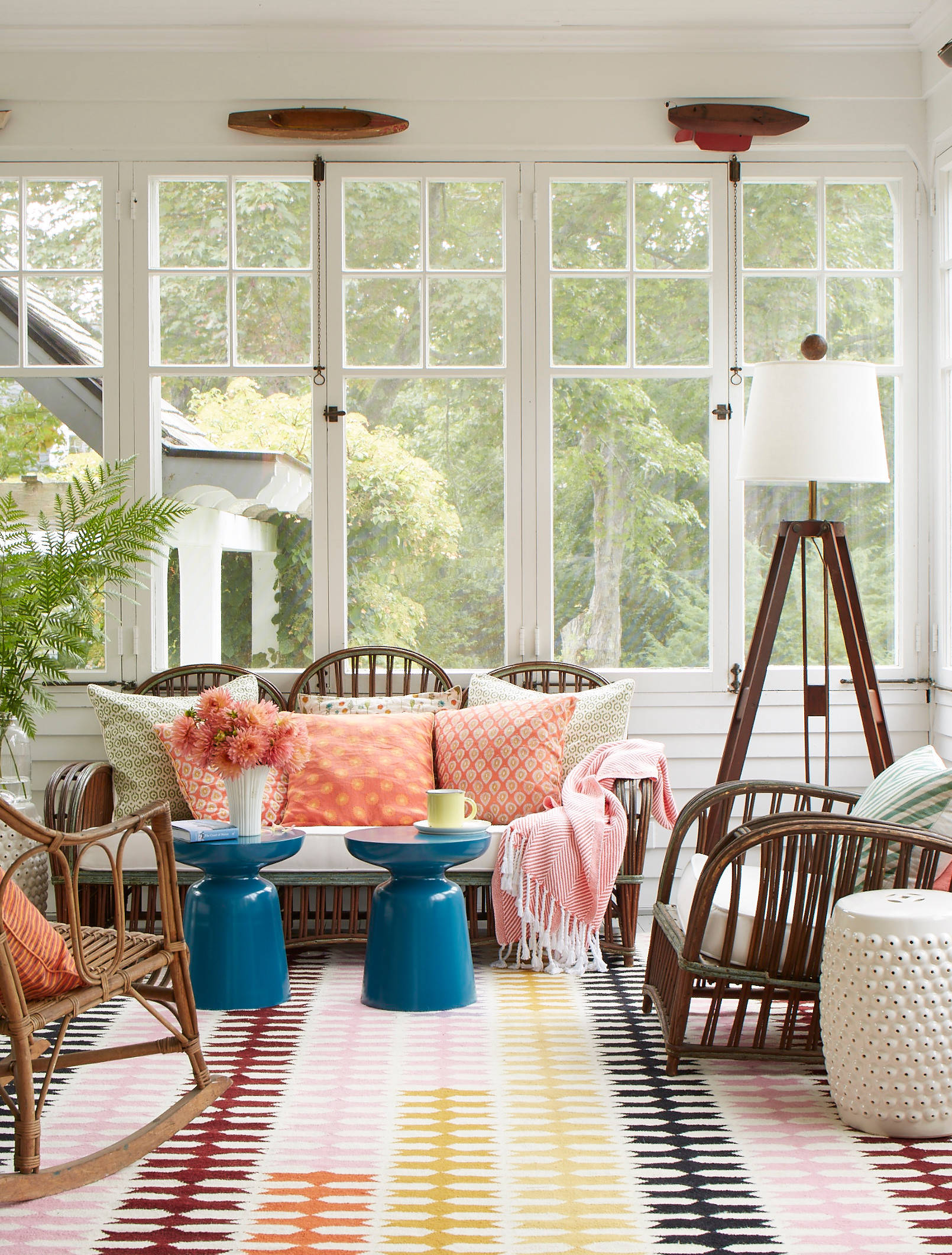 Whimsical coastal cottage interior featuring a home casual living room in home tour
