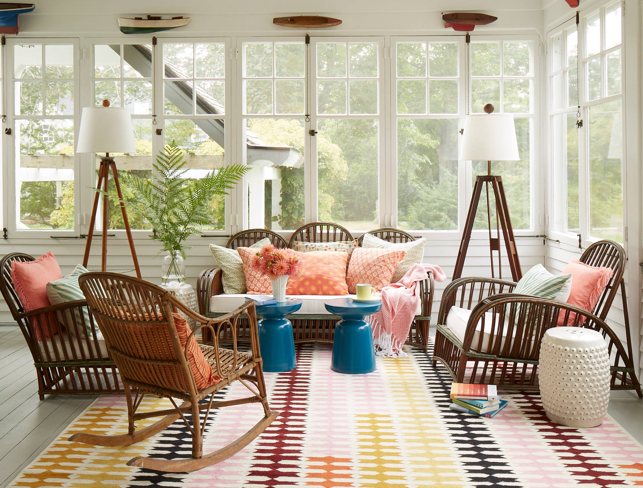 Whimsical coastal cottage interior featuring a home casual living room in home tour