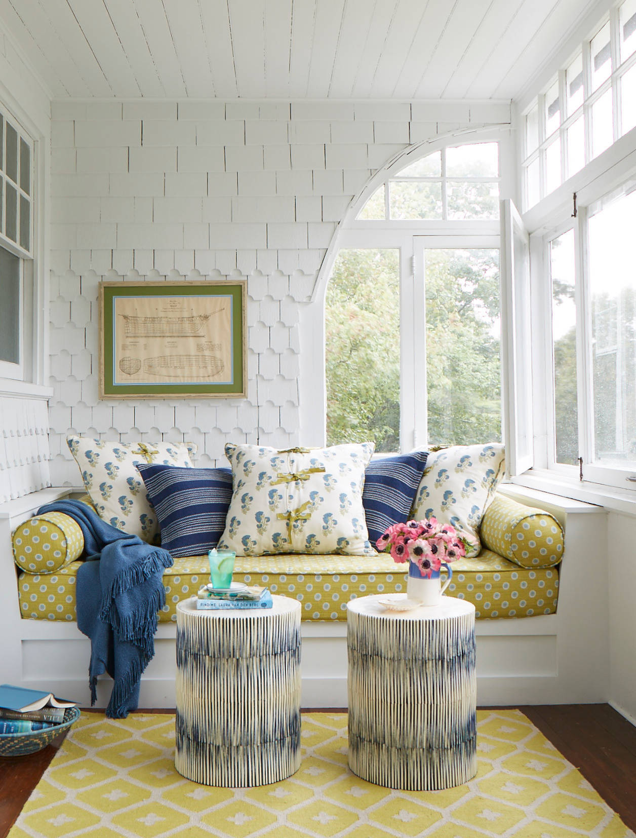 Whimsical coastal cottage interior featuring a home casual living room in home tour