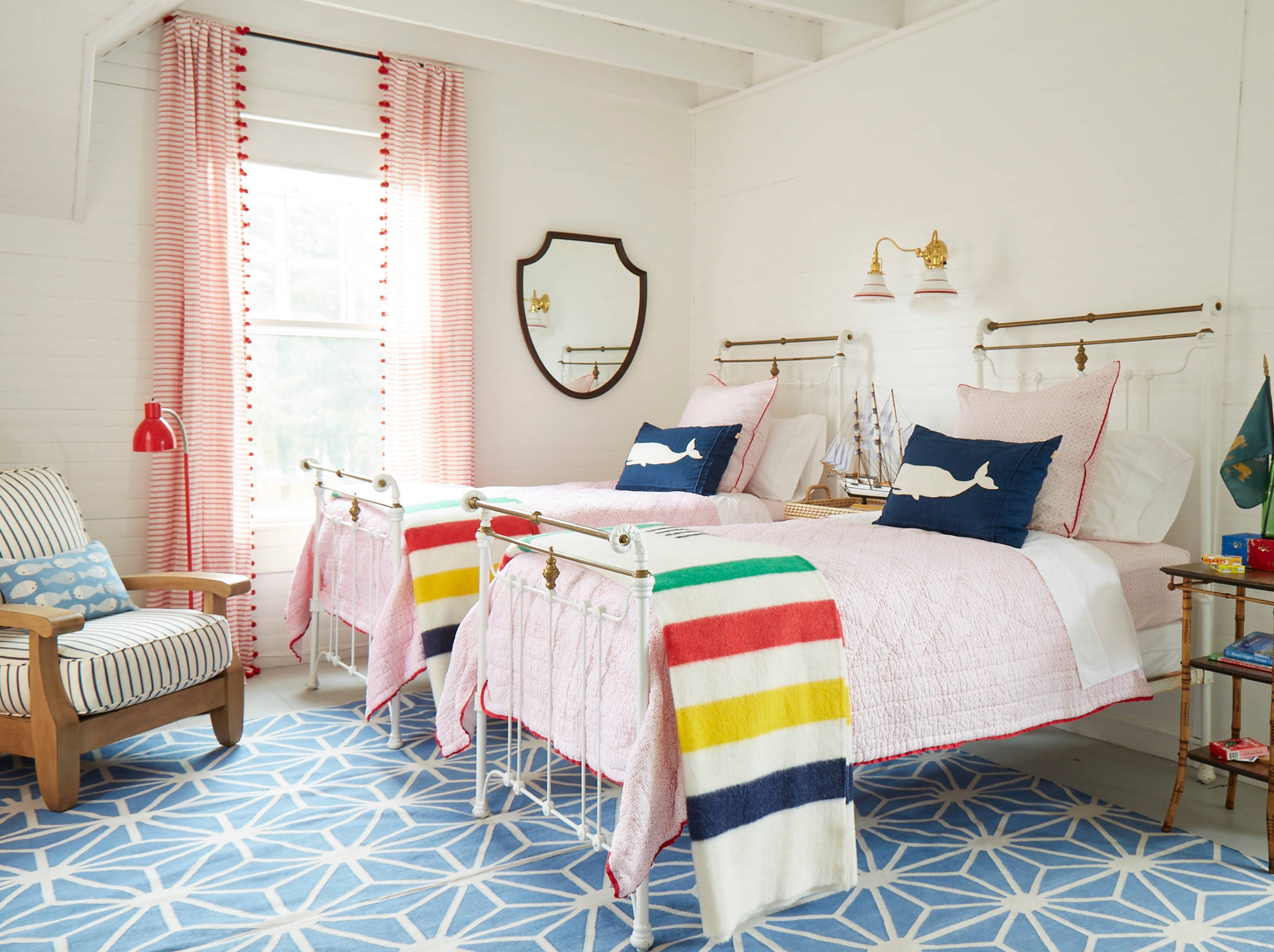 Whimsical coastal cottage interior featuring a home bedroom in home tour