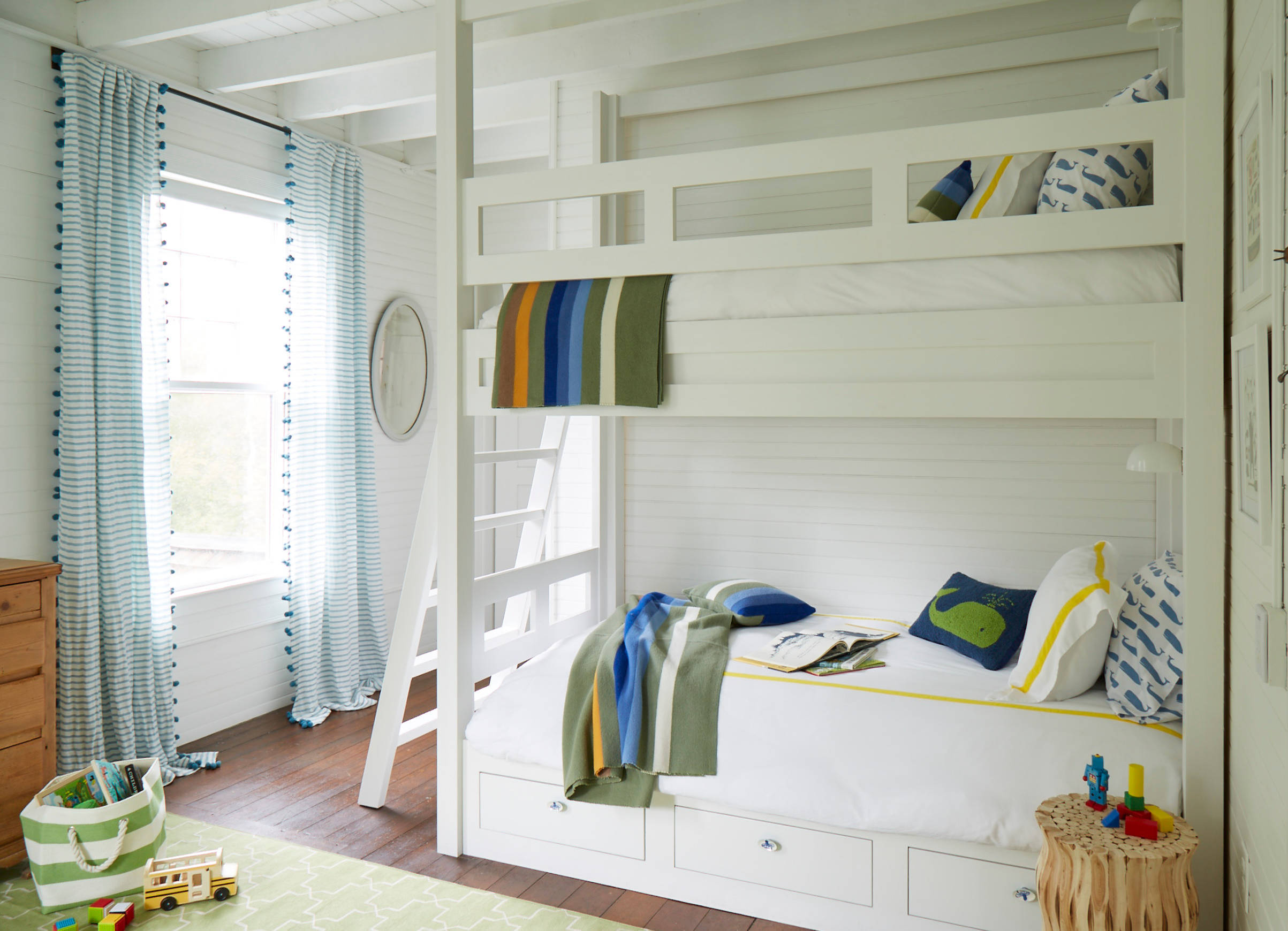 Whimsical coastal cottage interior featuring a home bedroom in home tour