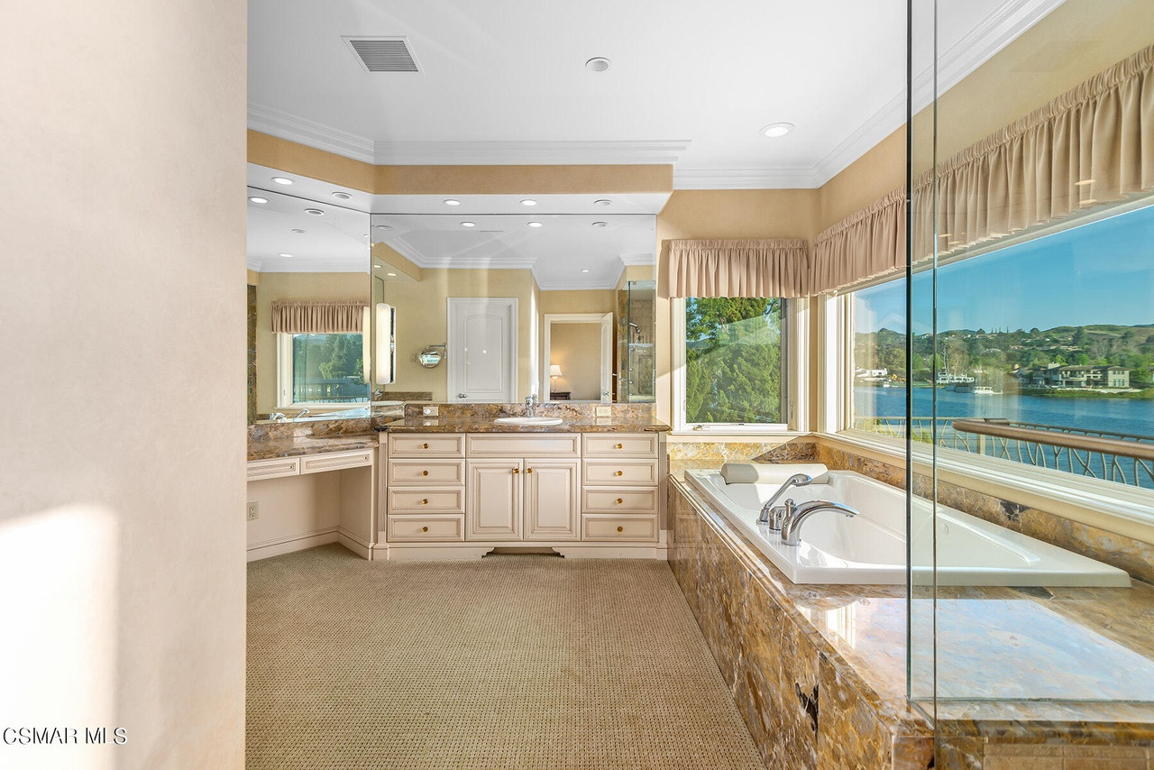 Modern Mediterranean lakeside home tour bathroom before