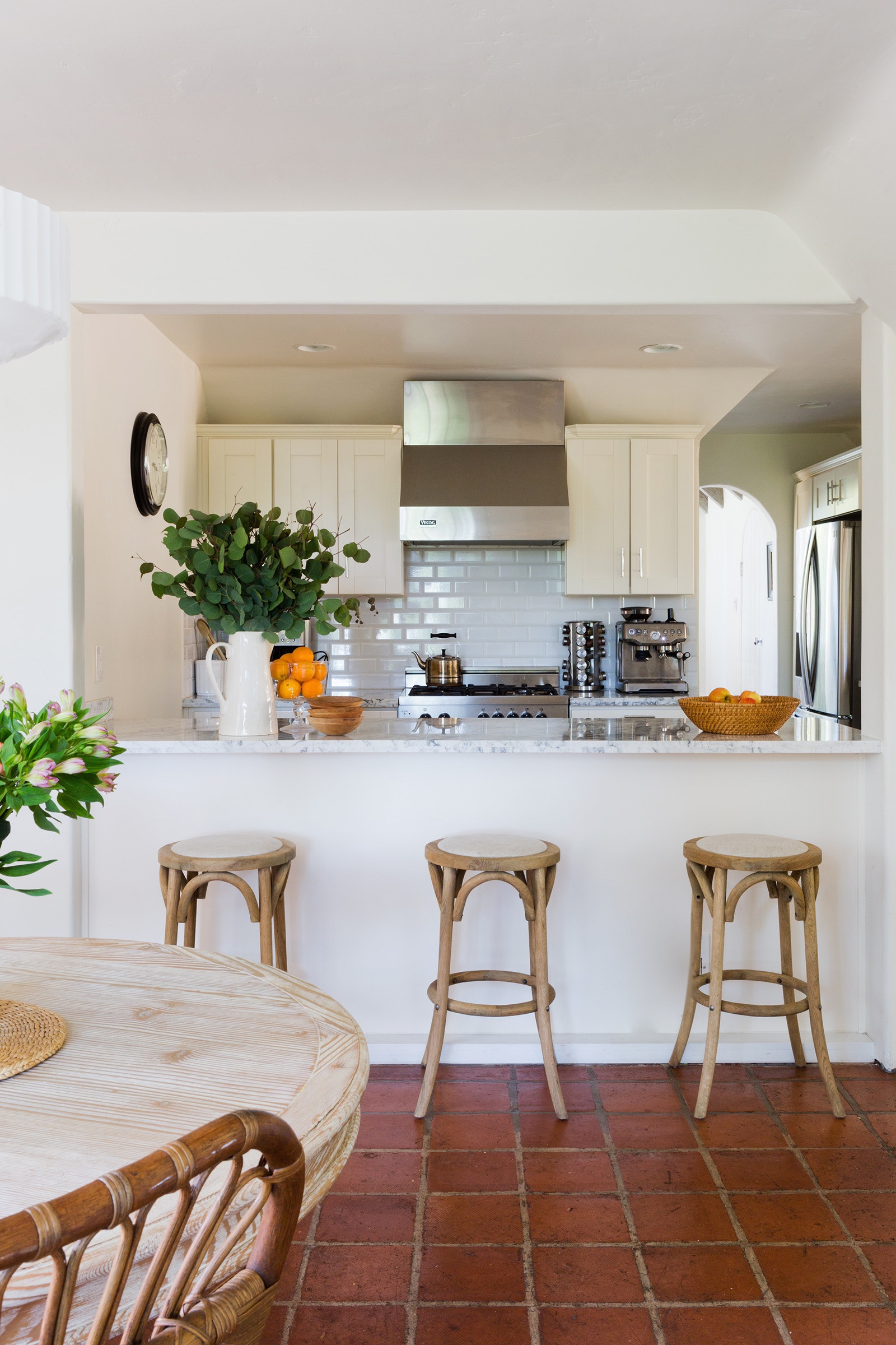 Home tour featuring a california with modern cottage interiors showcasing a kitchen.