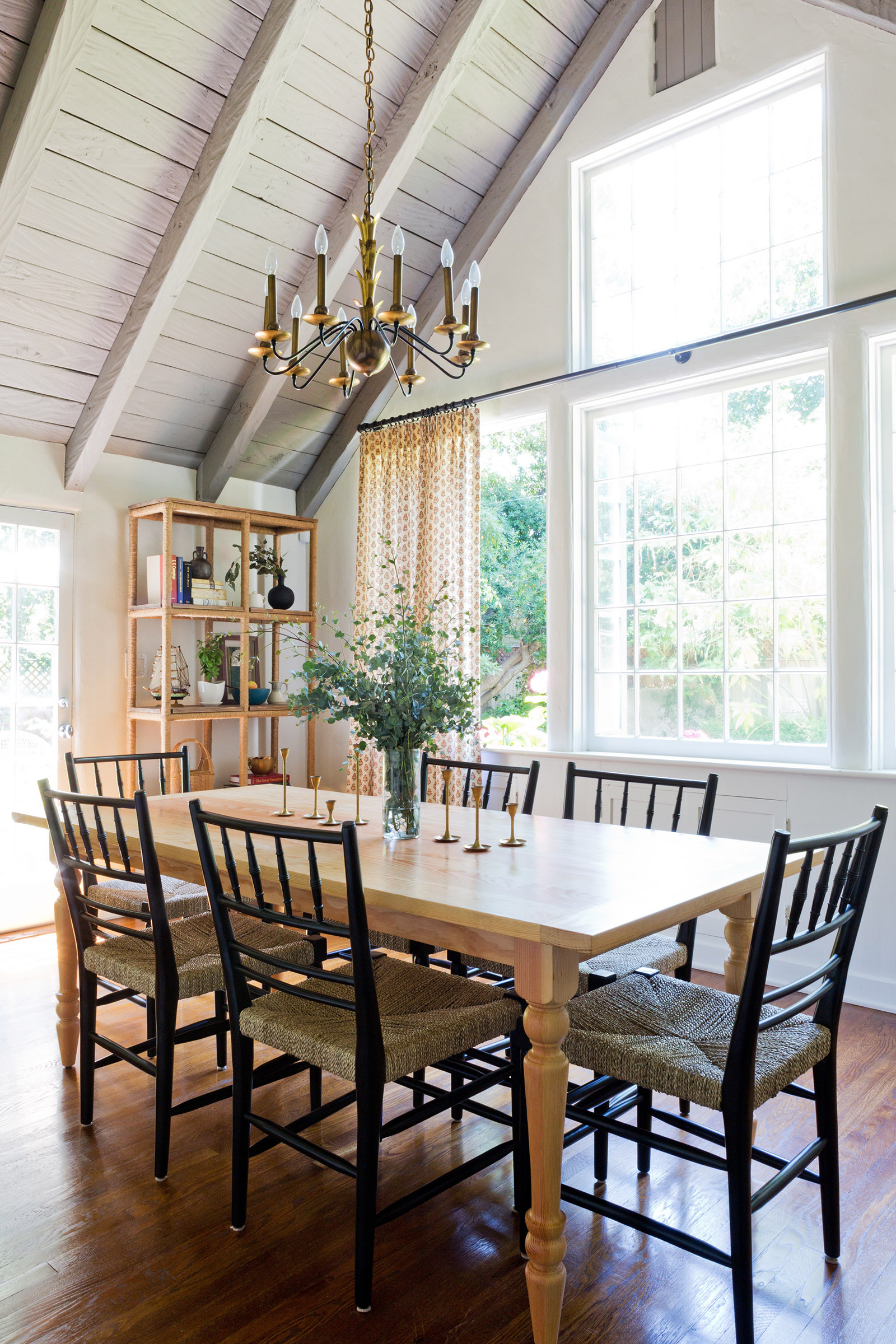 Home tour featuring a california with modern cottage interiors showcasing a formal dining room.