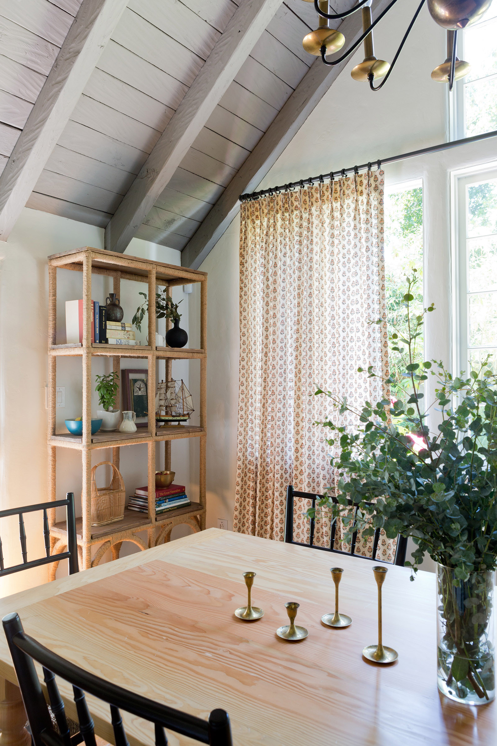 Home tour featuring a california with modern cottage interiors showcasing a formal dining room.