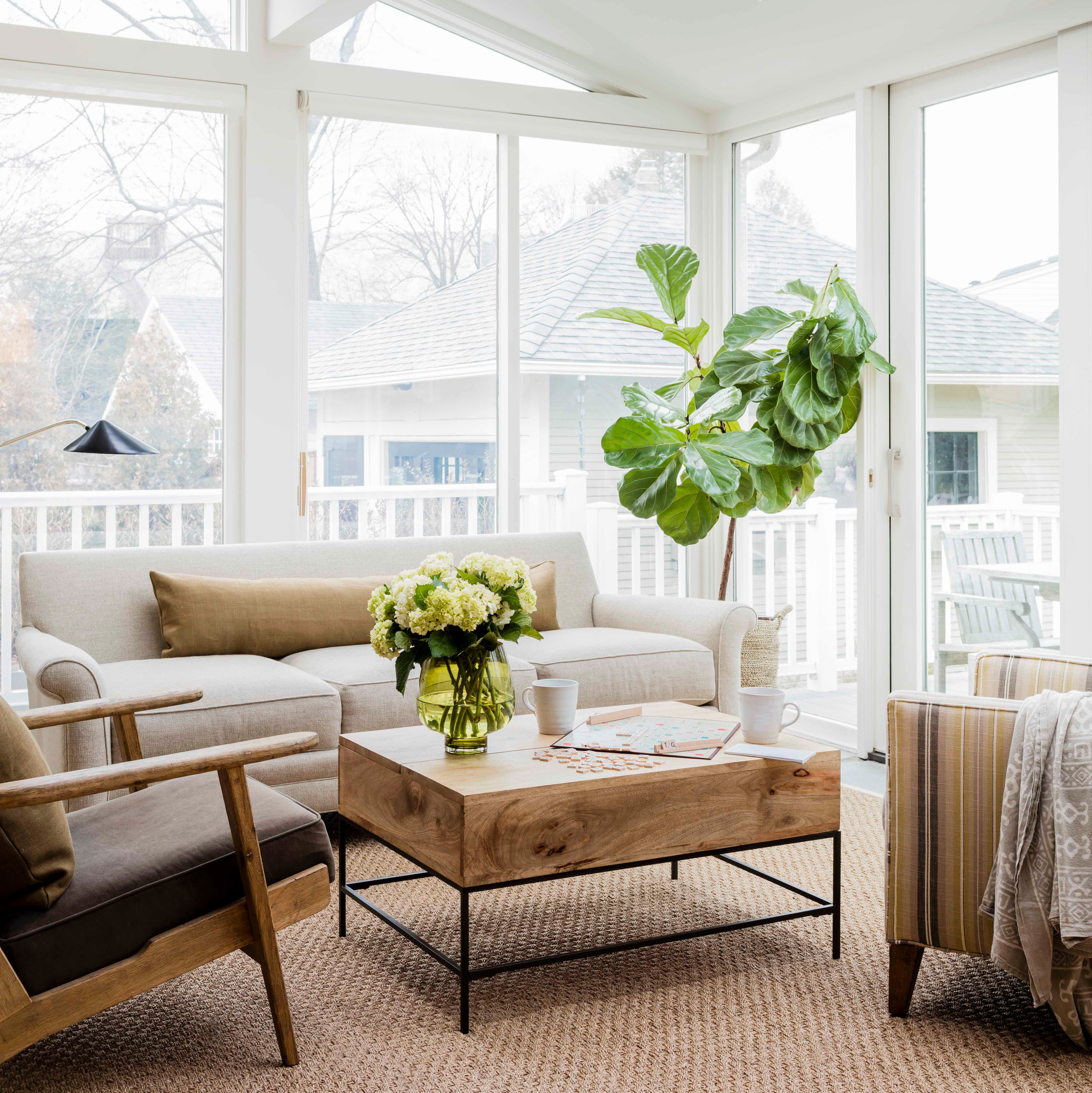 Sunroom with transitional historical renovation in New England featured of Styled and Comfortable Family Home Tour