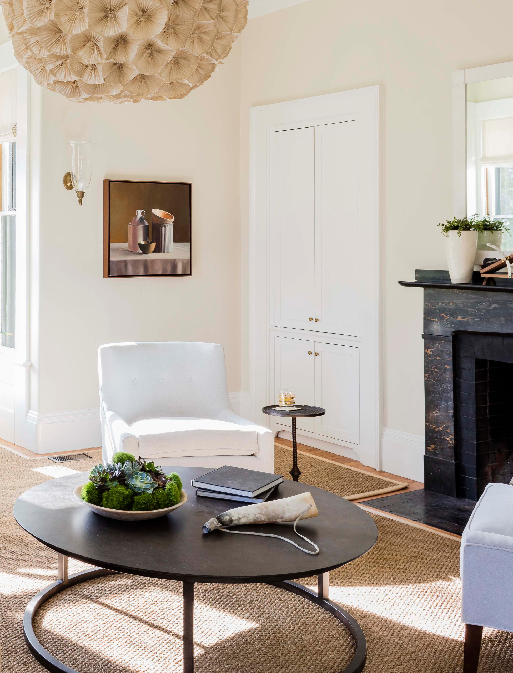 Living room with transitional historical renovation in New England featured of Styled and Comfortable Family Home Tour