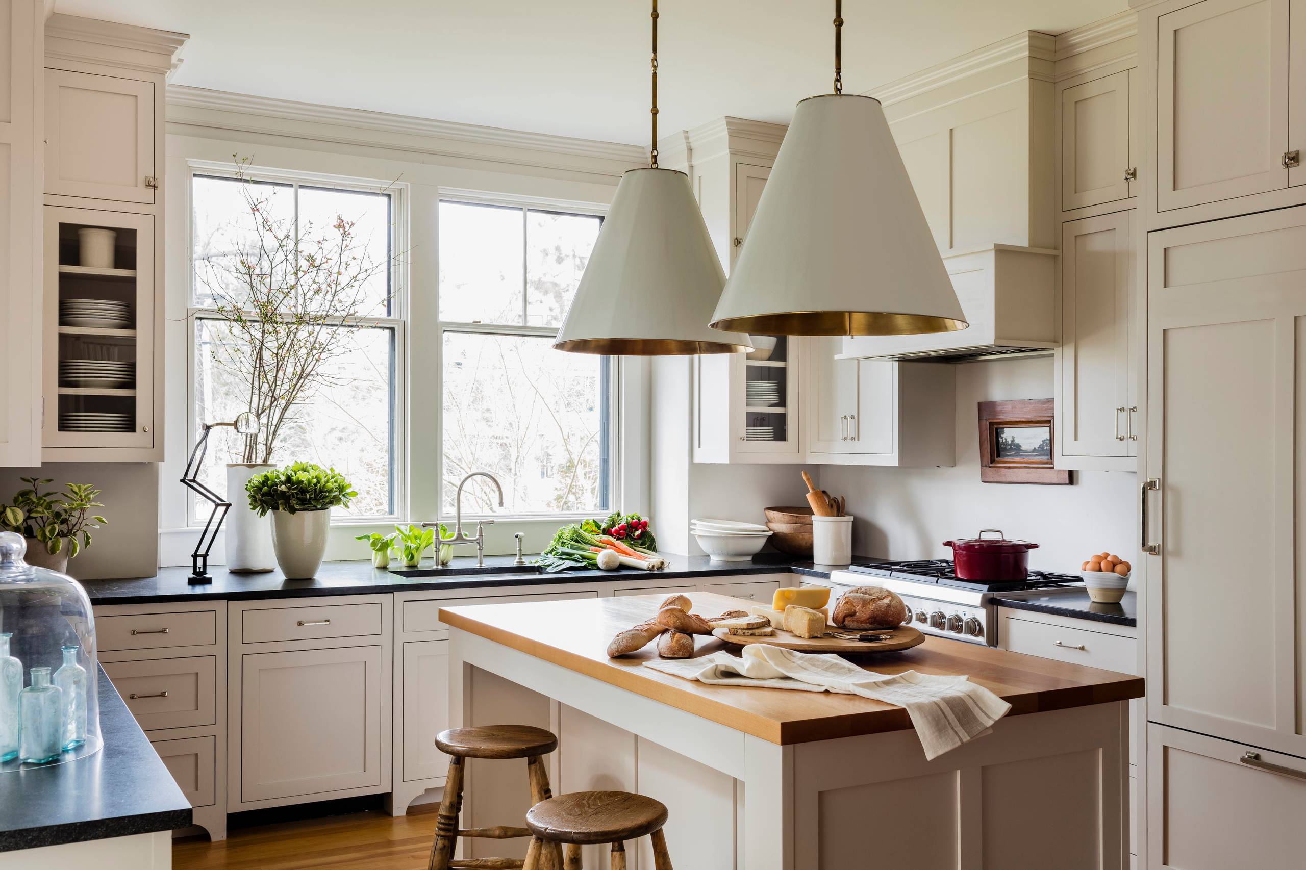 Kitchen with transitional historical renovation in New England featured of Styled and Comfortable Family Home Tour