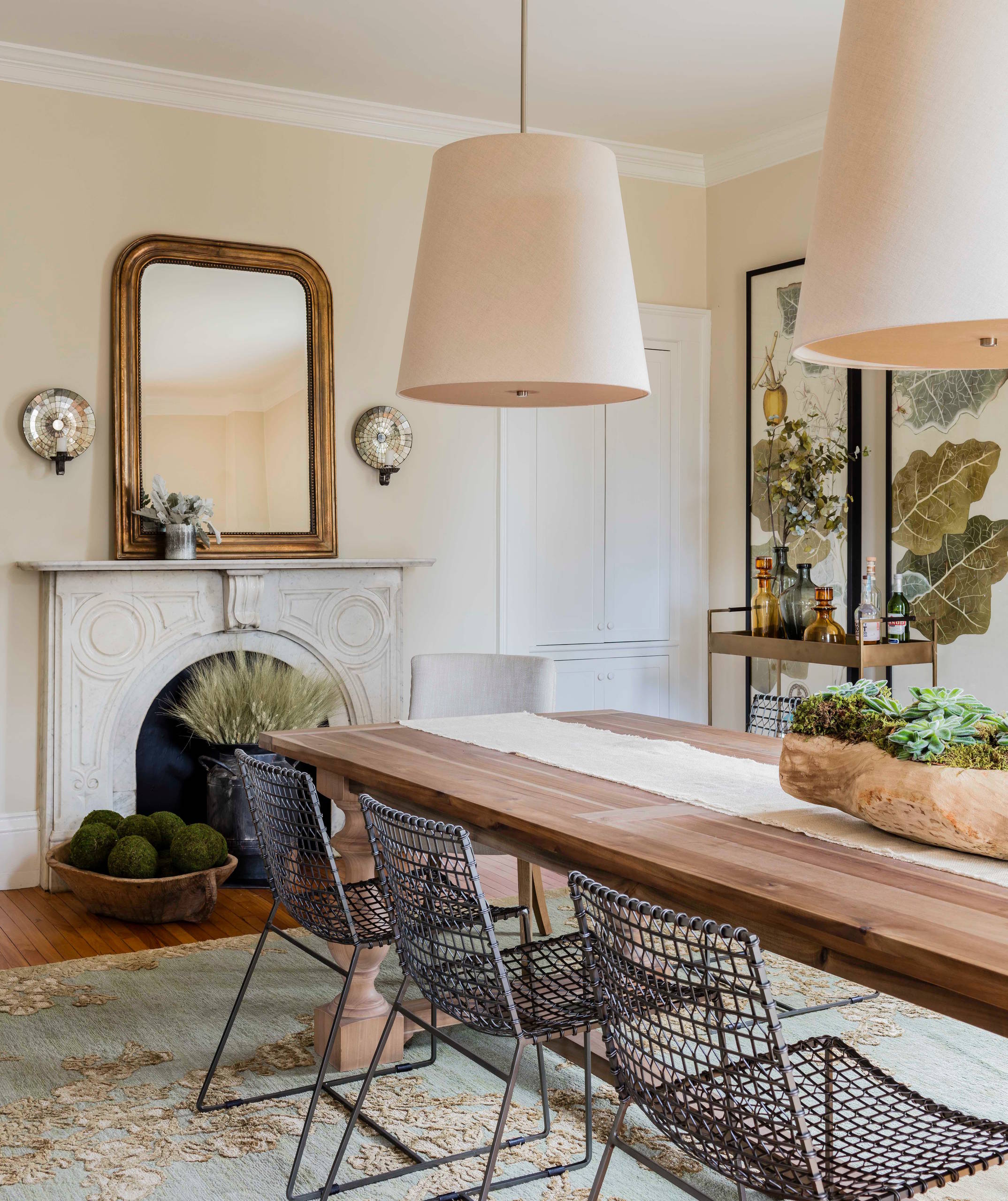Dining room with transitional historical renovation in New England featured of Styled and Comfortable Family Home Tour