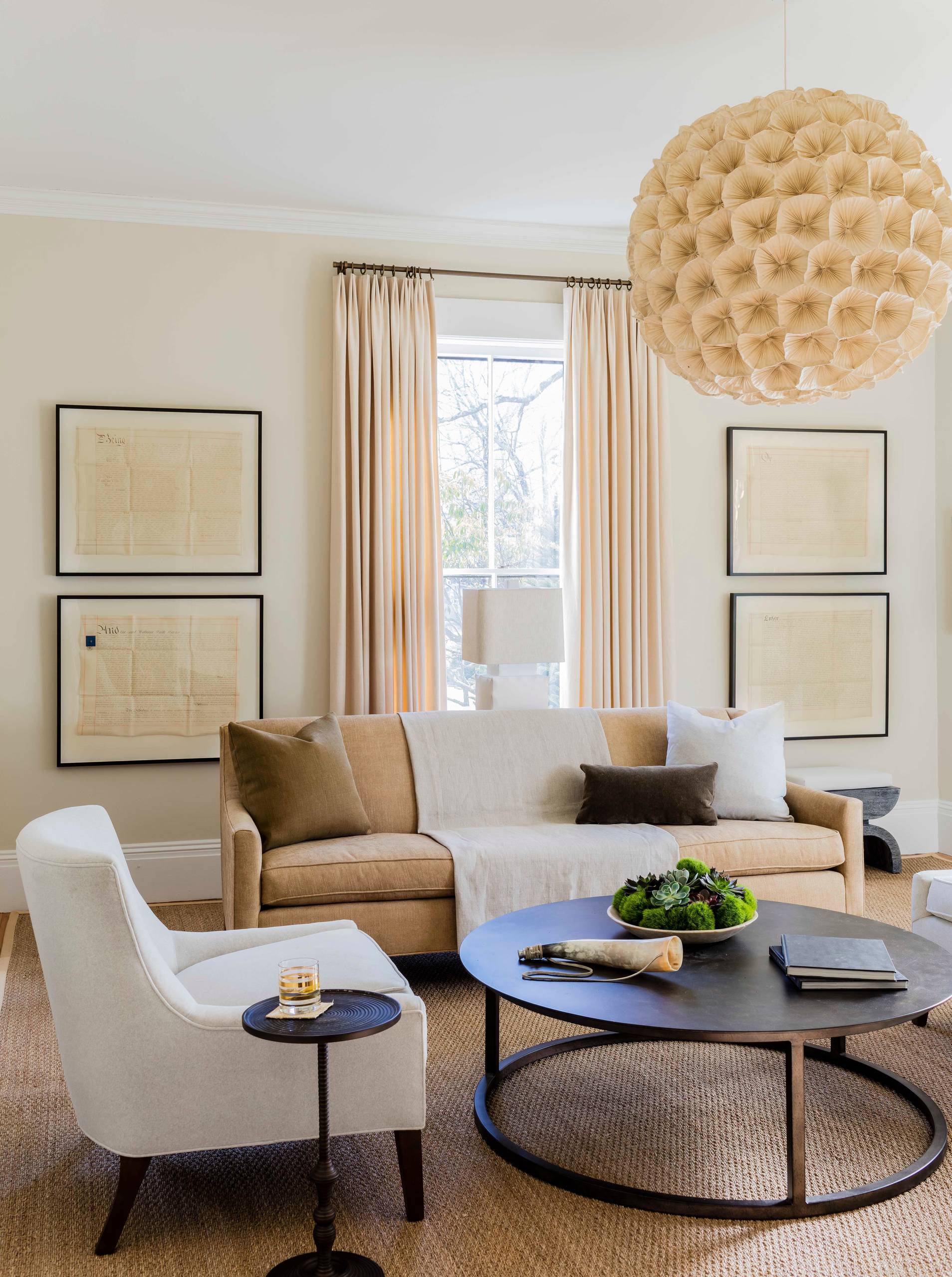 Living room with transitional historical renovation in New England featured of Styled and Comfortable Family Home Tour