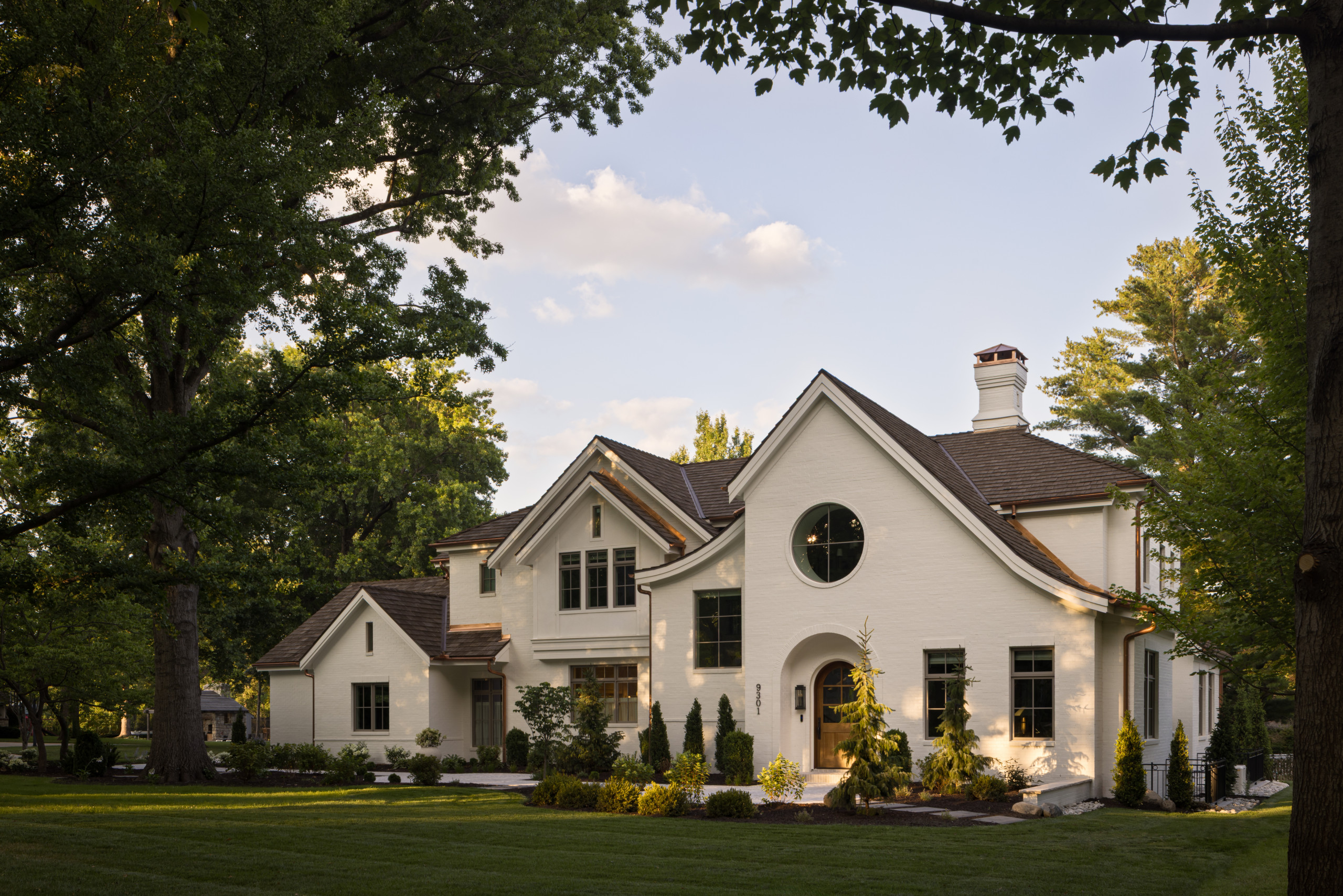 Home outdoors featured in Lee Boulevard Home Tour as an example of a Historic Home Renovation with a transitional modern heritage style.