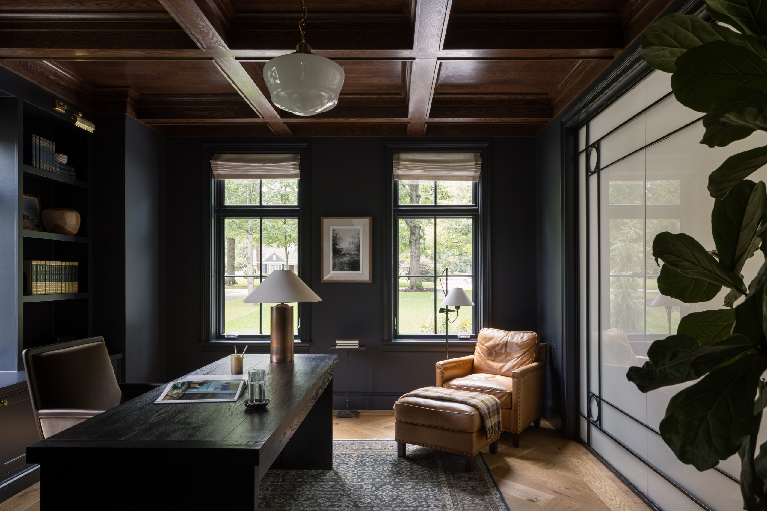 Study room featured in Lee Boulevard Home Tour as an example of a Historic Home Renovation with a transitional modern heritage style.