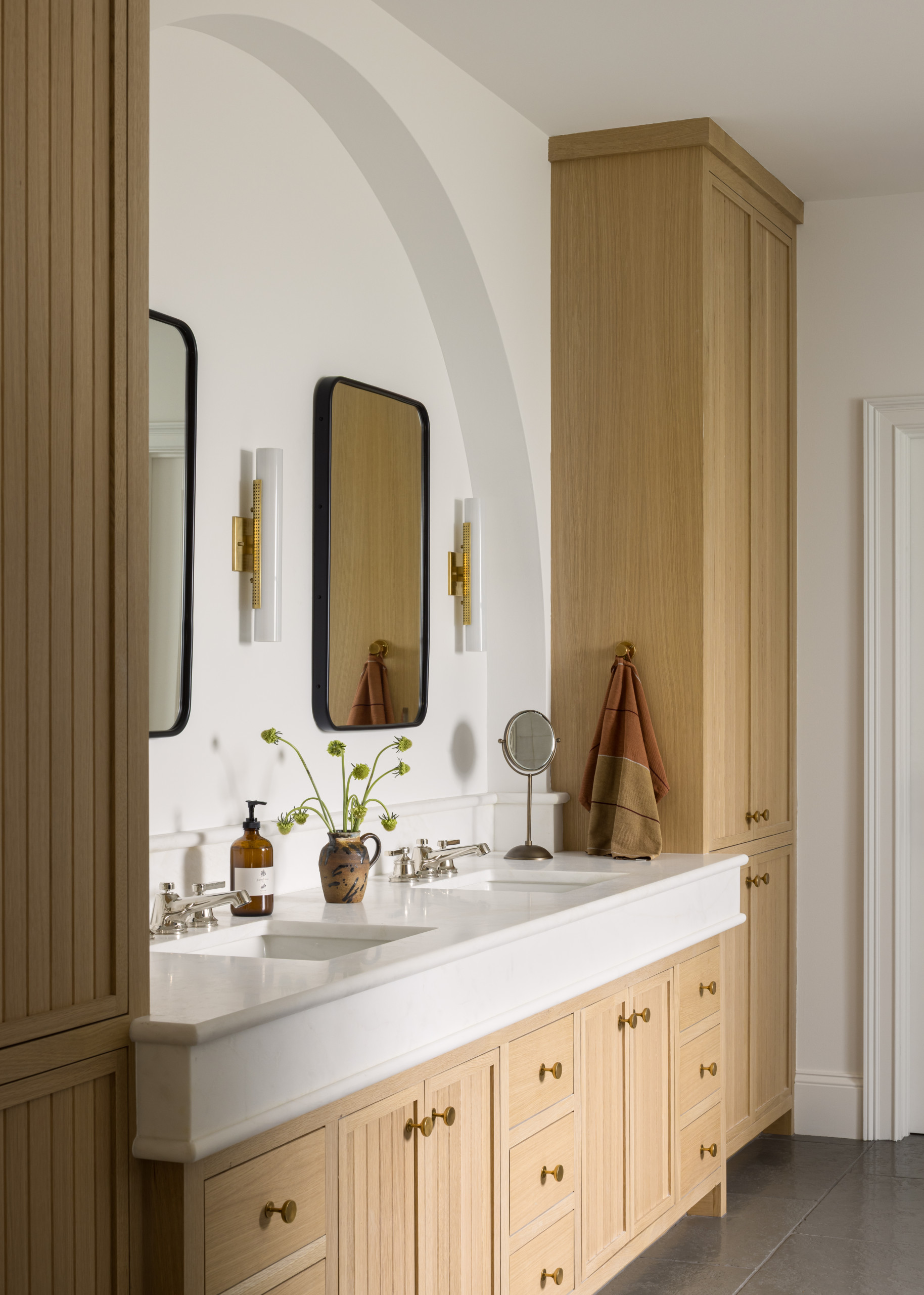 Bathroom featured in Lee Boulevard Home Tour as an example of a Historic Home Renovation with a transitional modern heritage style.