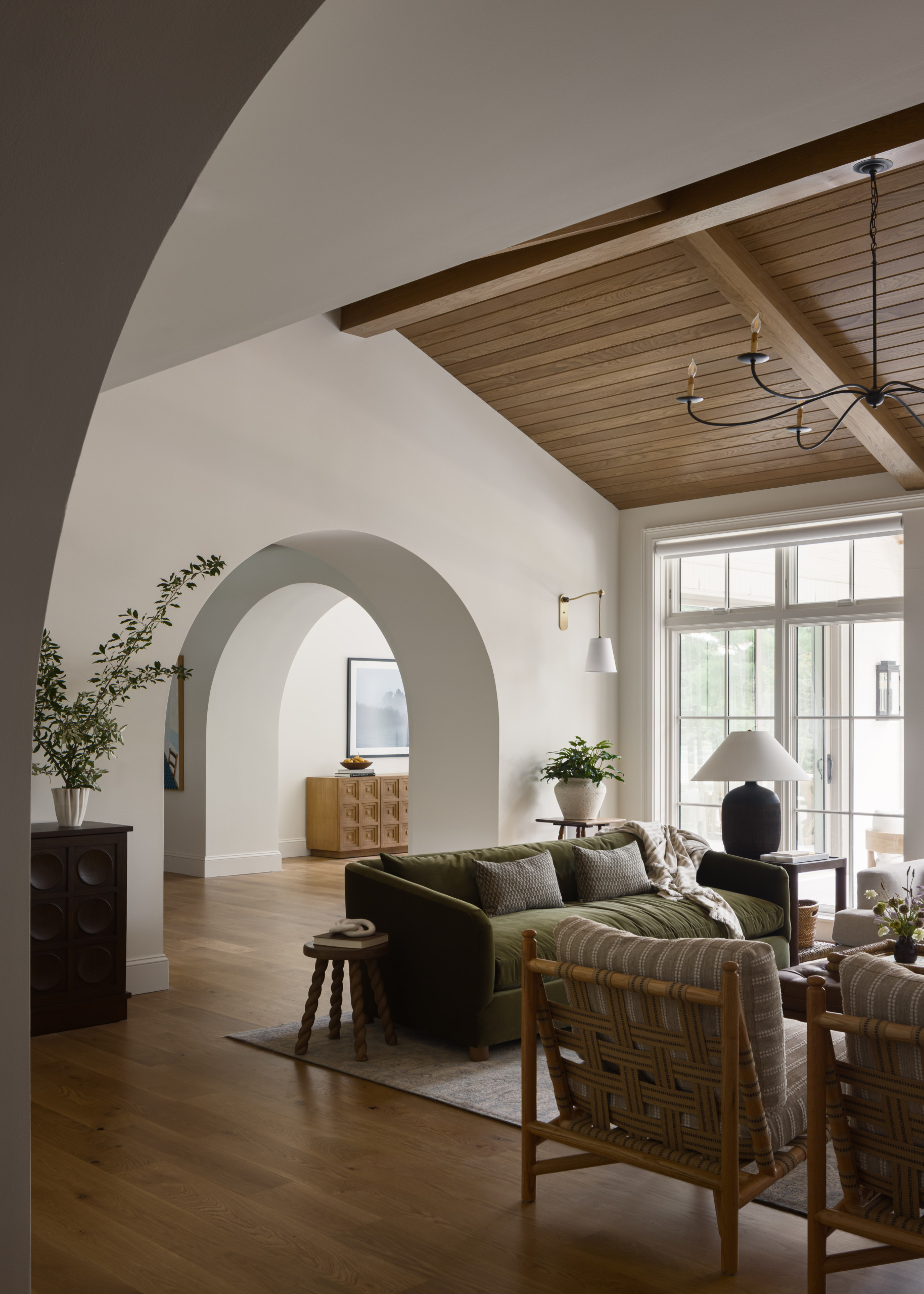 Living room featured in Lee Boulevard Home Tour as an example of a Historic Home Renovation with a transitional modern heritage style.
