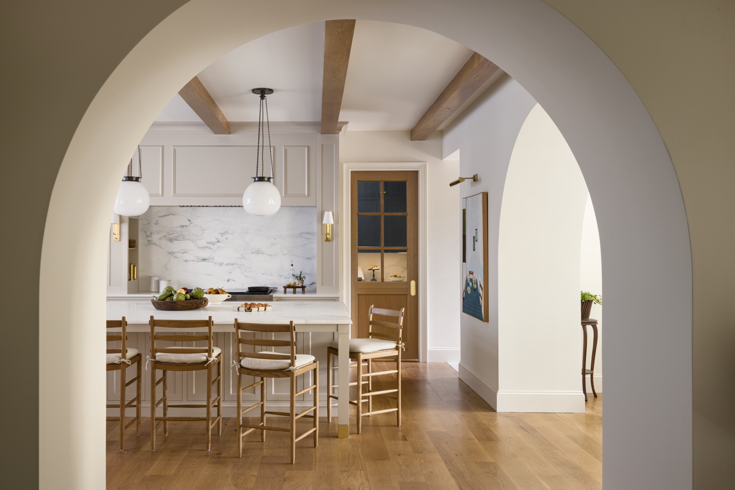 Kitchen featured in Lee Boulevard Home Tour as an example of a Historic Home Renovation with a transitional modern heritage style.