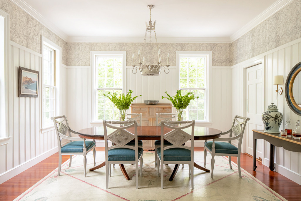 Coastal home tour featuring beach house interiors with a modern take on traditional style fwaturing a dining room