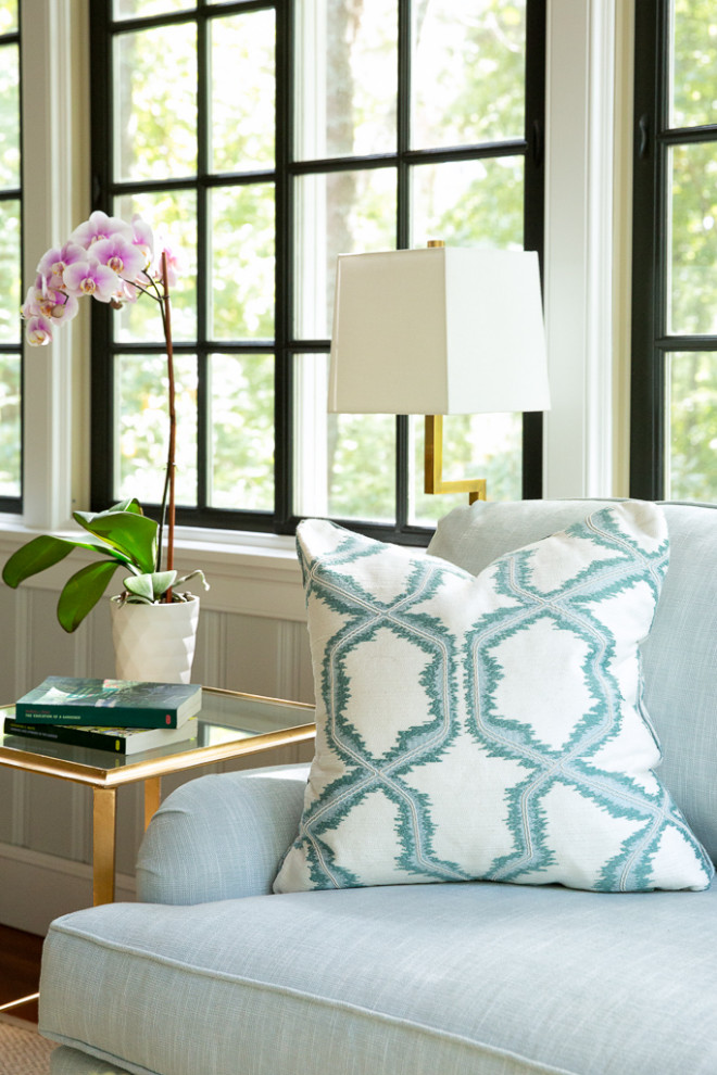 Coastal home tour featuring beach house interiors with a modern take on traditional style fwaturing a suroom