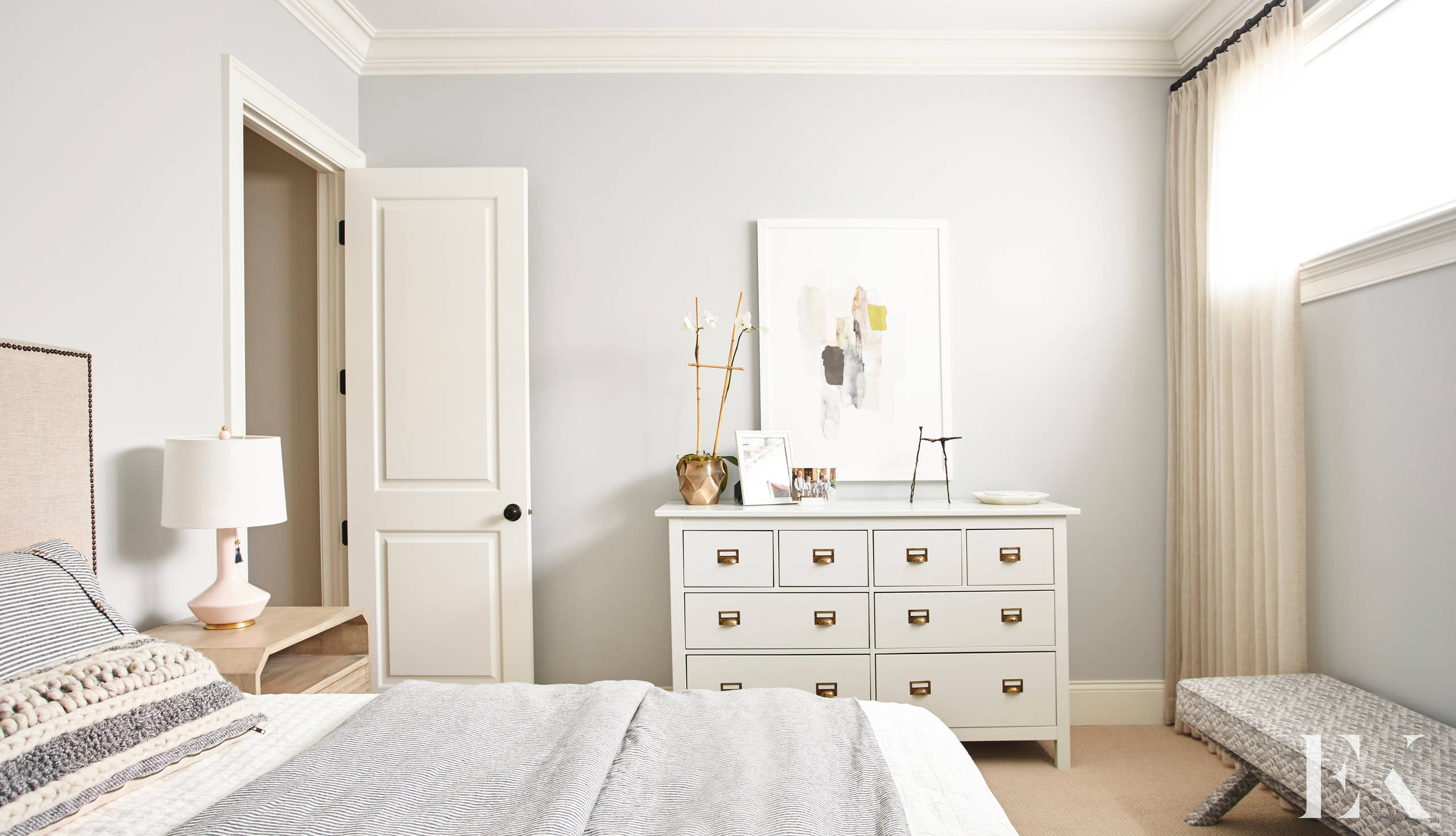 Family home tour featuring a guest room with contemporary style with cozy home decor
