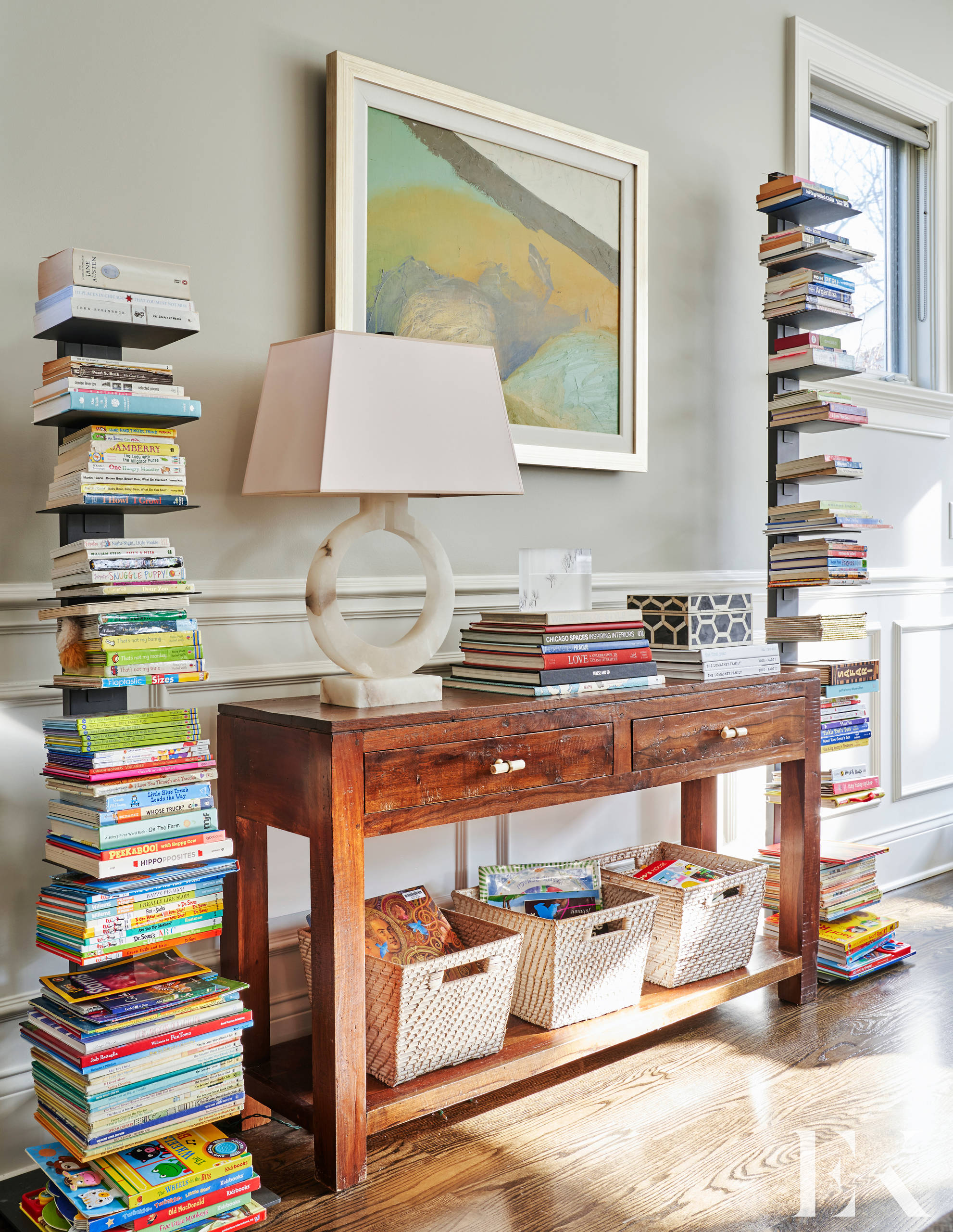 Family home tour featuring a wood console table in the entryway with a cozy home decor style