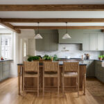 Kitchen from Seaside Colonial home tour designed by Beige and Bleu Design Studio in modern transitional heritage style.