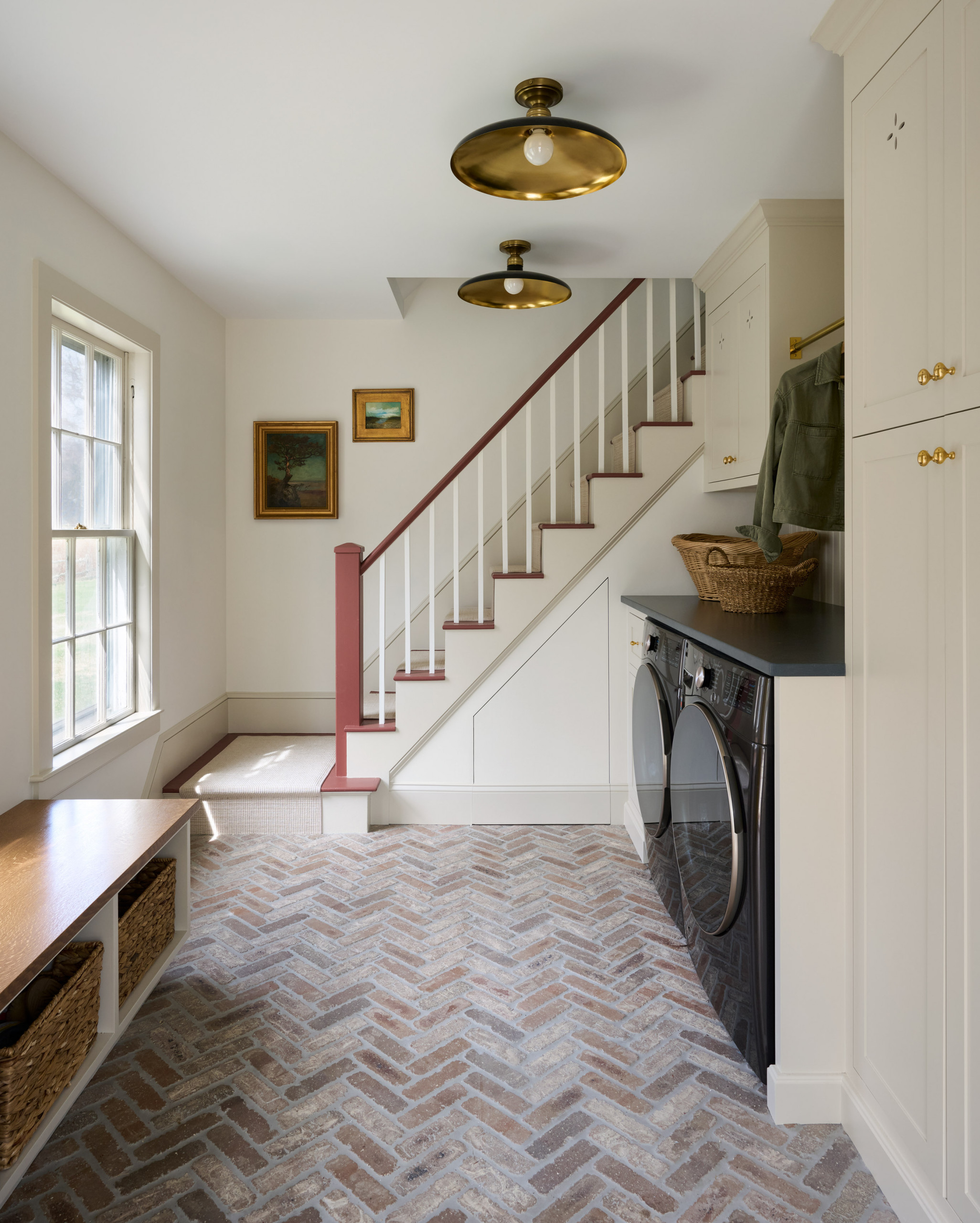 Mudroom laundry from Seaside Colonial home tour designed by Beige and Bleu Design Studio in modern transitional heritage style.