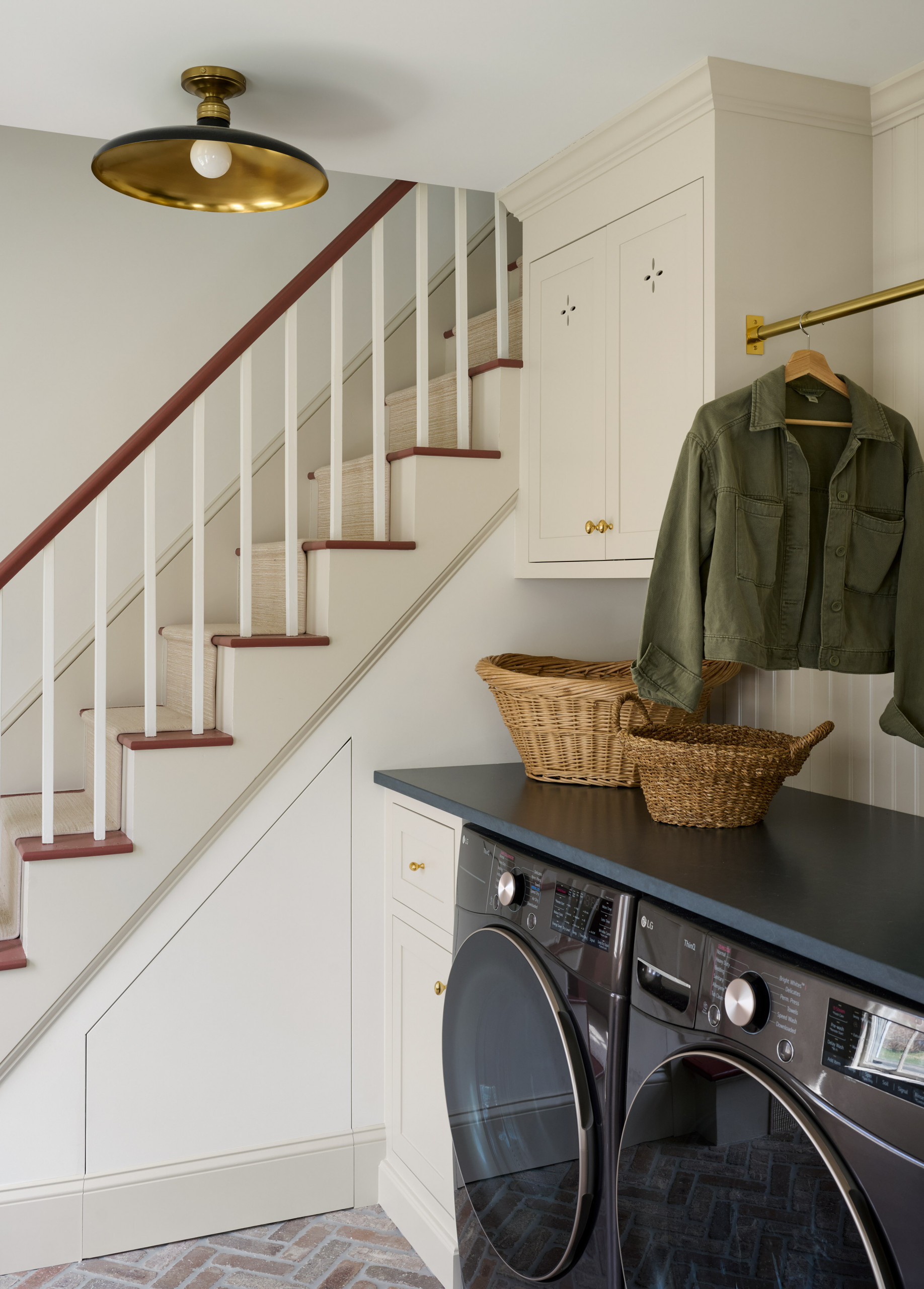 Mudroom laundry from Seaside Colonial home tour designed by Beige and Bleu Design Studio in modern transitional heritage style.