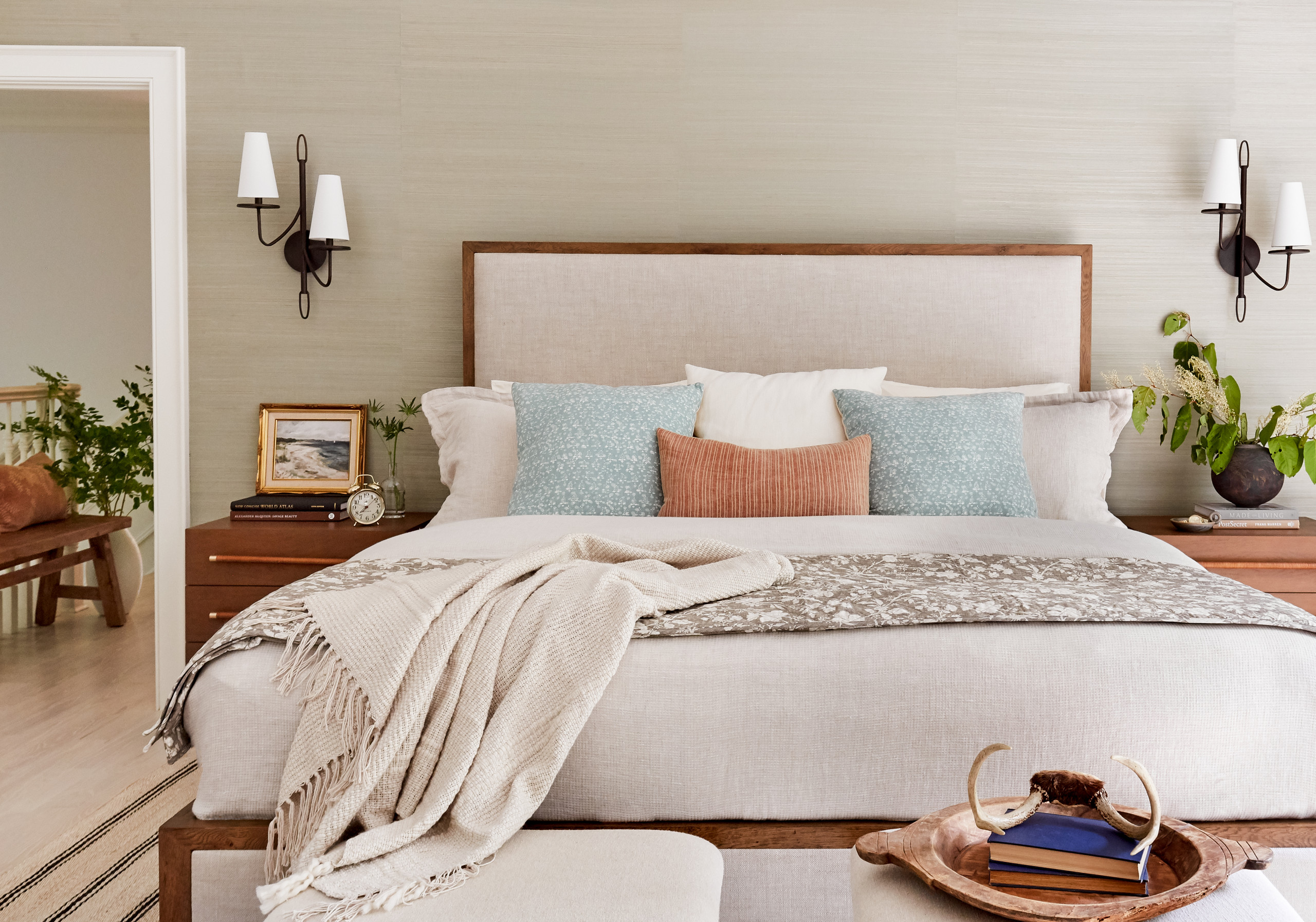 Coastal bedroom bed part of the Sag Harbor Full Home Renovation Home Tour